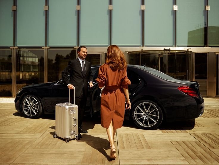 Private chauffeur client walking to car